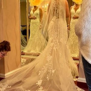 Eddy K wedding gown never worn or altered.